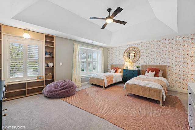 311 E Schiller St, Elmhurst, IL 60126 - carpeted bedroom with wallpapered walls, a tray ceiling, baseboards, and a ceiling fan