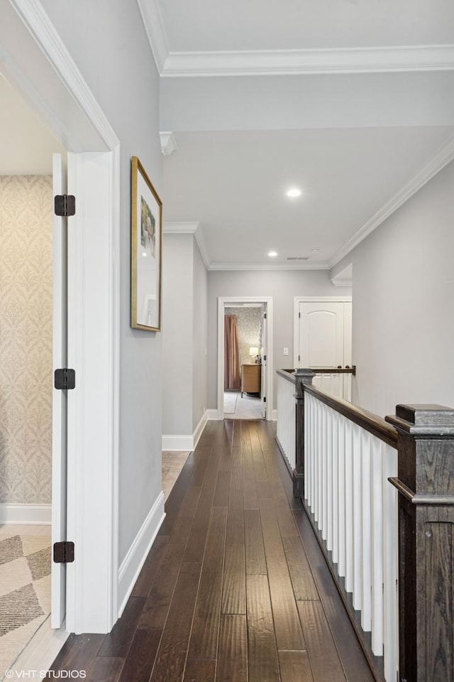 311 E Schiller St, Elmhurst, IL 60126 - hallway with dark wood finished floors, baseboards, an upstairs landing, recessed lighting, and crown molding