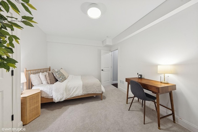 311 E Schiller St, Elmhurst, IL 60126 - bedroom with an office area, carpet, and baseboards