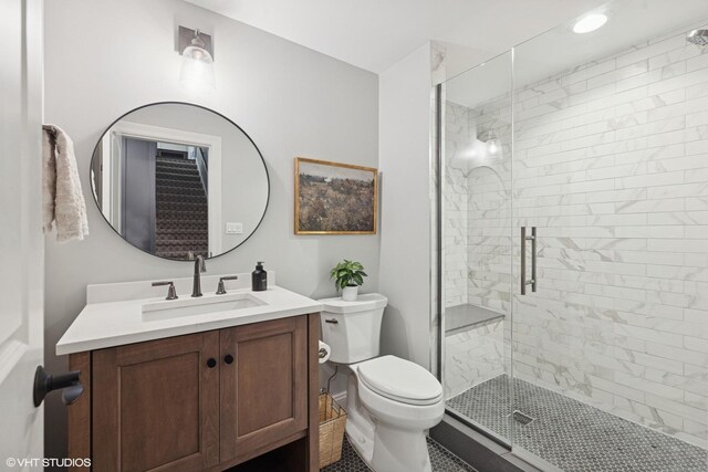 311 E Schiller St, Elmhurst, IL 60126 - bathroom featuring toilet, a shower stall, and vanity