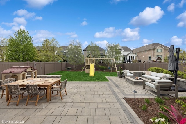 311 E Schiller St, Elmhurst, IL 60126 - view of patio / terrace featuring an outdoor fire pit, a residential view, outdoor dining area, and a playground
