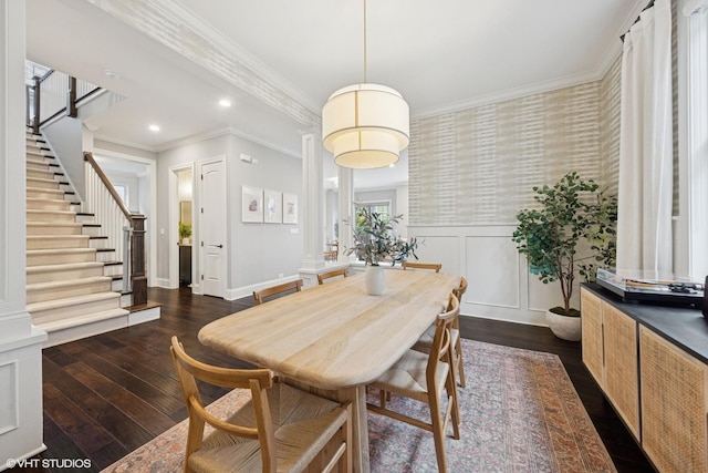 311 E Schiller St, Elmhurst, IL 60126 - dining area with ornate columns, wallpapered walls, dark wood-style floors, wainscoting, and ornamental molding