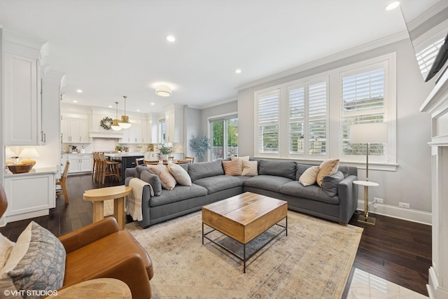 311 E Schiller St, Elmhurst, IL 60126 - living room with dark wood-style flooring, crown molding, recessed lighting, and baseboards