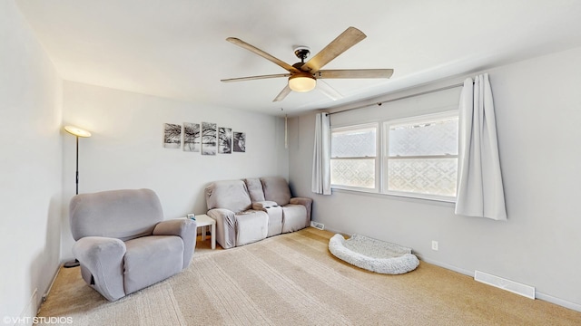 2818 Brentwood Dr, Racine, WI 53403 - sitting room featuring a ceiling fan, carpet flooring, and baseboards