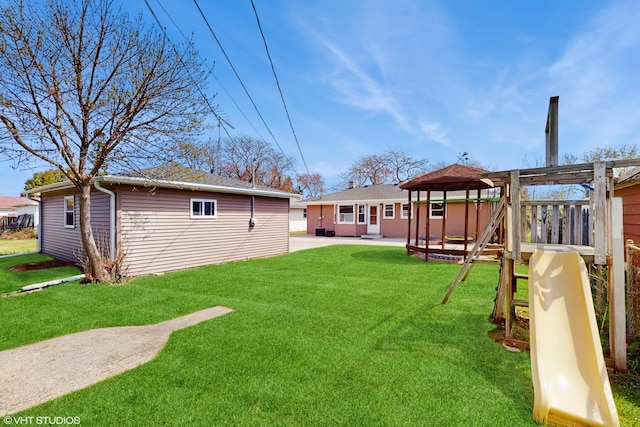 2818 Brentwood Dr, Racine, WI 53403 - view of grassy yard with a gazebo and a patio area
