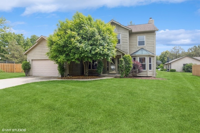 325 Olin Ct, Algonquin, IL 60102 - view of front of house with a chimney, driveway, and an attached garage