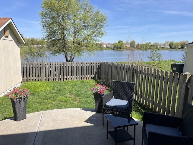 view of patio / terrace with a water view