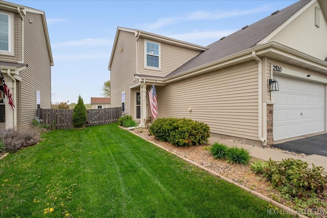 view of property exterior featuring driveway and roof with shingles