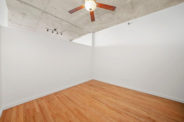 1720 S Michigan Ave Unit 2113, Chicago, IL 60616 - unfurnished room featuring wood finished floors and ceiling fan