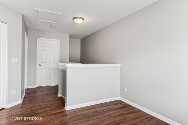 24733 Patriot Square Dr S, Plainfield, IL 60544 - hall with dark wood-style floors, baseboards, an upstairs landing, and attic access