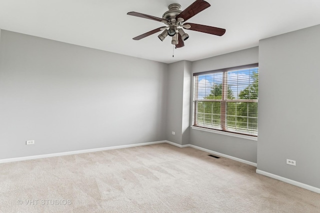24733 Patriot Square Dr S, Plainfield, IL 60544 - empty room with carpet flooring, baseboards, and ceiling fan