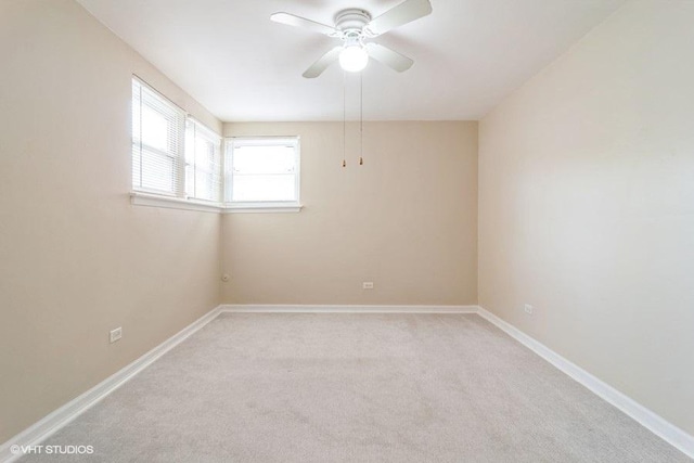 2642 N Harlem Ave Unit Gw, Elmwood Park, IL 60707 - unfurnished room with ceiling fan, light colored carpet, and baseboards