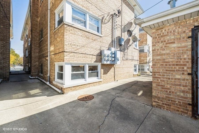 2642 N Harlem Ave Unit Gw, Elmwood Park, IL 60707 - view of side of property featuring brick siding
