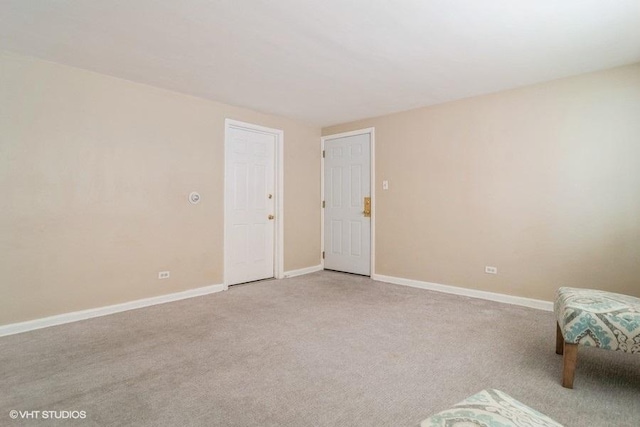 2642 N Harlem Ave Unit Gw, Elmwood Park, IL 60707 - unfurnished room with light carpet and baseboards
