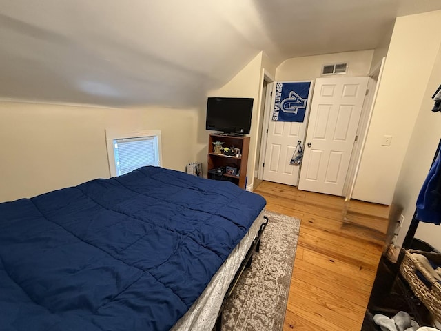 160 S Fordham Ave, Aurora, IL 60506 - bedroom with vaulted ceiling and hardwood / wood-style floors