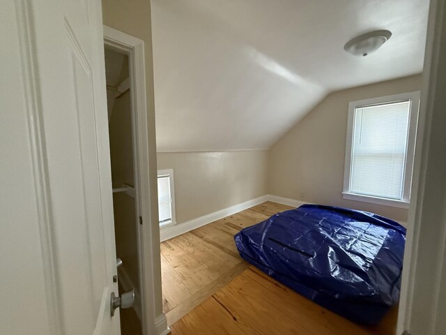 160 S Fordham Ave, Aurora, IL 60506 - bedroom with lofted ceiling and wood finished floors