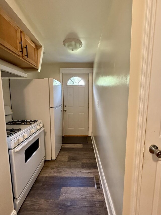 160 S Fordham Ave, Aurora, IL 60506 - kitchen with white appliances, dark wood-type flooring, brown cabinetry, and extractor fan