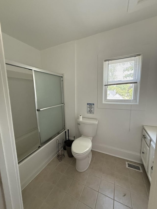 160 S Fordham Ave, Aurora, IL 60506 - full bathroom with vanity, tile patterned floors, and combined bath / shower with glass door