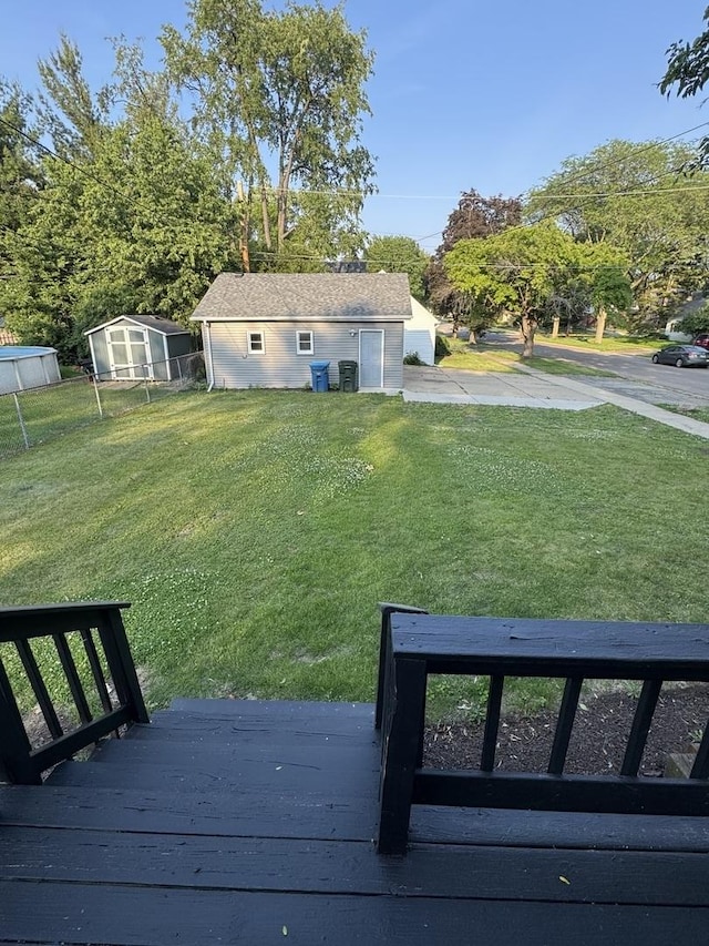 160 S Fordham Ave, Aurora, IL 60506 - view of grassy yard with a greenhouse and an outbuilding