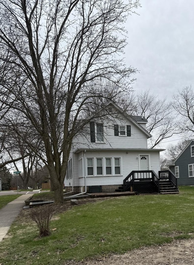 160 S Fordham Ave, Aurora, IL 60506 - view of front facade featuring a front yard and a deck