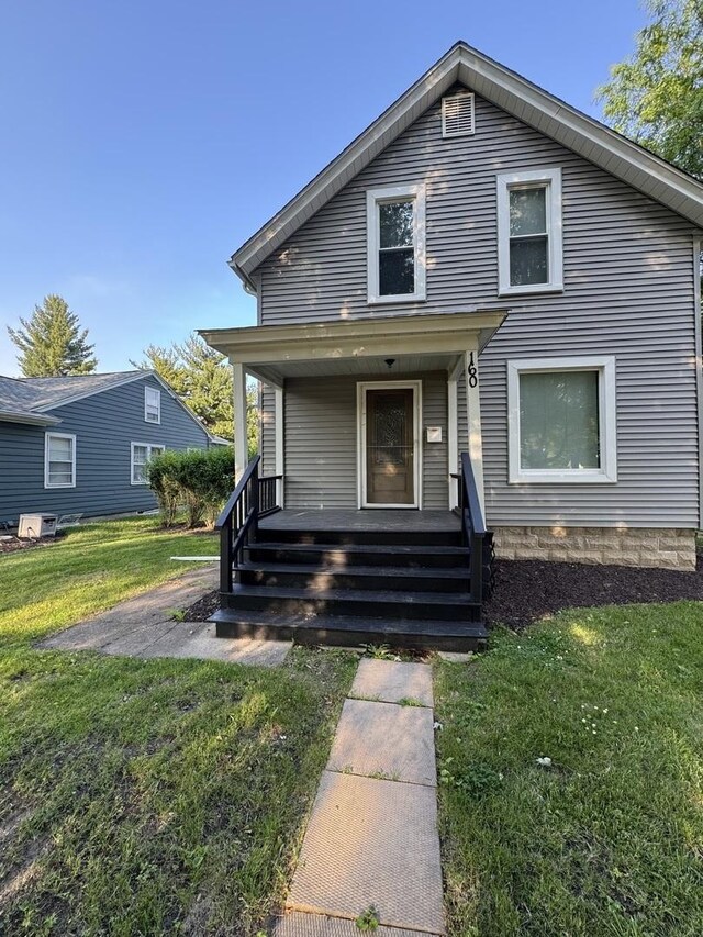 160 S Fordham Ave, Aurora, IL 60506 - view of front facade with a porch and a front yard