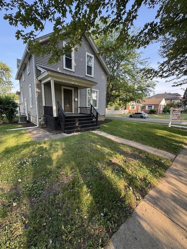 160 S Fordham Ave, Aurora, IL 60506 - view of front of property featuring covered porch and a front lawn
