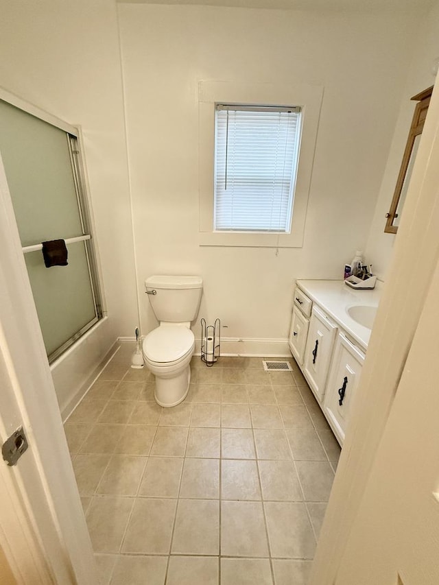 160 S Fordham Ave, Aurora, IL 60506 - bathroom with tile patterned floors, vanity, and combined bath / shower with glass door