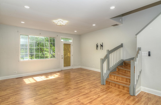 2205 Gladstone Ct, Glendale Heights, IL 60139 - foyer featuring healthy amount of natural light, baseboards, light wood finished floors, and recessed lighting