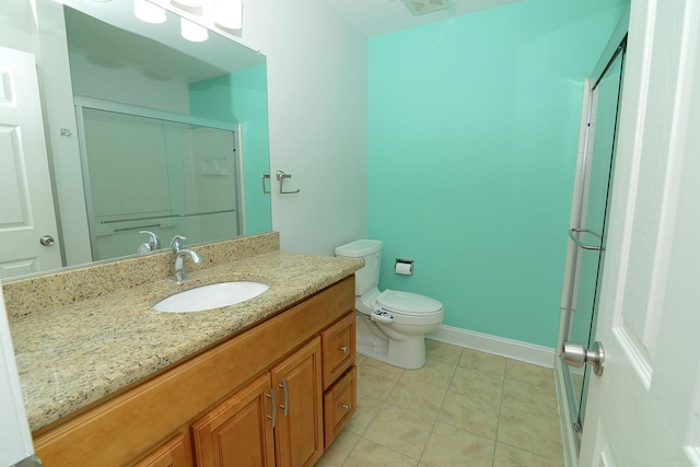 2205 Gladstone Ct, Glendale Heights, IL 60139 - full bathroom with vanity, a stall shower, toilet, and tile patterned flooring