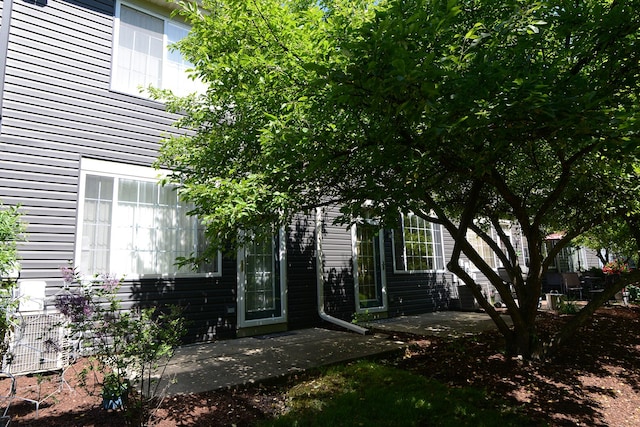 2205 Gladstone Ct, Glendale Heights, IL 60139 - view of exterior entry featuring a patio area