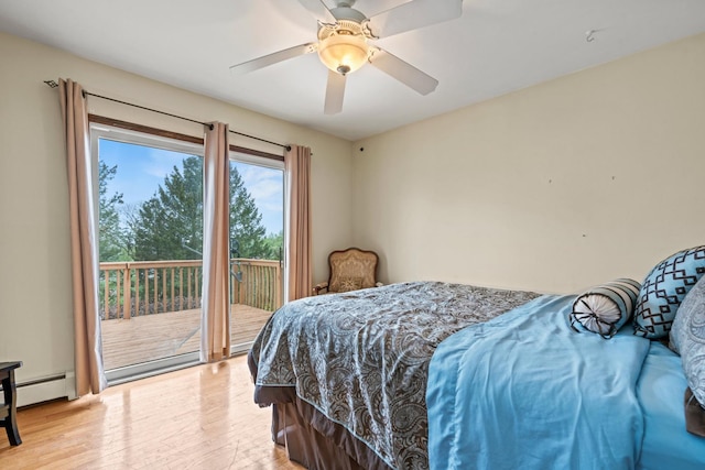 bedroom featuring access to exterior, light wood-type flooring, ceiling fan, and a baseboard radiator