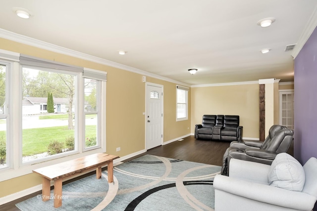 193 Thunderbird Trl, Carol Stream, IL 60188 - living area featuring baseboards, dark wood-style flooring, ornamental molding, and visible vents