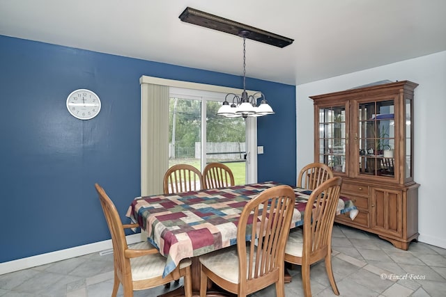 193 Thunderbird Trl, Carol Stream, IL 60188 - dining room featuring baseboards, an inviting chandelier, and light tile patterned flooring