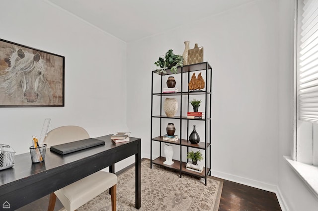 home office with wood finished floors and baseboards
