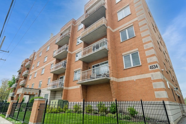 4534 N Cumberland Ave Unit 207, Chicago, IL 60656 - view of apartment building / complex with fence