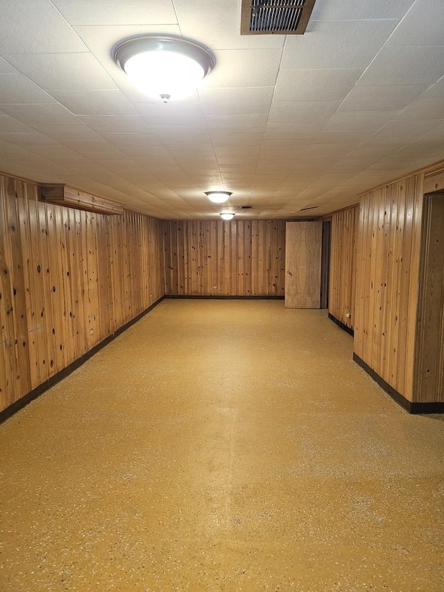 656 E 160th Pl, South Holland, IL 60473 - finished below grade area with wooden walls, baseboards, light floors, and visible vents