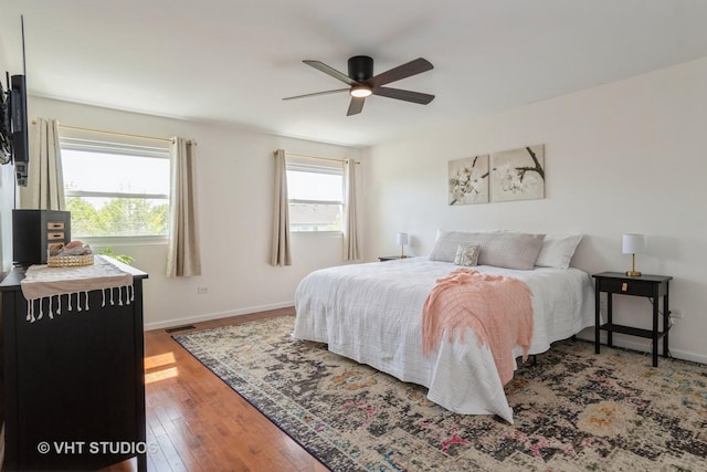 129 S Palmer Dr, Bolingbrook, IL 60490 - bedroom with hardwood / wood-style flooring, baseboards, and a ceiling fan