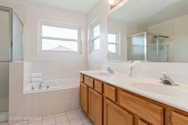 129 S Palmer Dr, Bolingbrook, IL 60490 - bathroom featuring a shower stall, a bath, tile patterned flooring, and double vanity