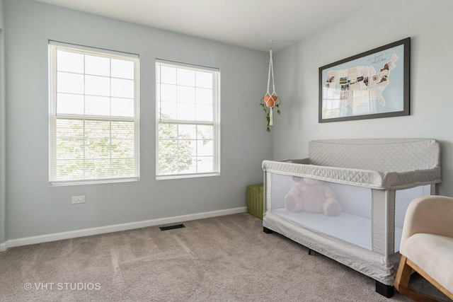 129 S Palmer Dr, Bolingbrook, IL 60490 - sitting room featuring plenty of natural light, carpet floors, and baseboards