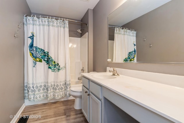 129 S Palmer Dr, Bolingbrook, IL 60490 - bathroom featuring vanity, shower / bath combo, toilet, and wood finished floors