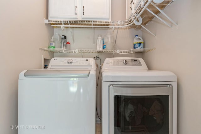 129 S Palmer Dr, Bolingbrook, IL 60490 - clothes washing area featuring washer and clothes dryer and cabinet space