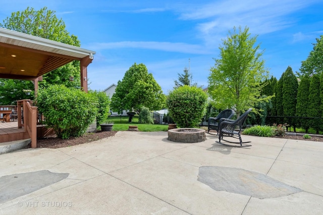 129 S Palmer Dr, Bolingbrook, IL 60490 - view of patio with an outdoor fire pit and a deck
