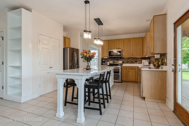 129 S Palmer Dr, Bolingbrook, IL 60490 - kitchen with stainless steel appliances, built in shelves, light countertops, light tile patterned flooring, and decorative backsplash