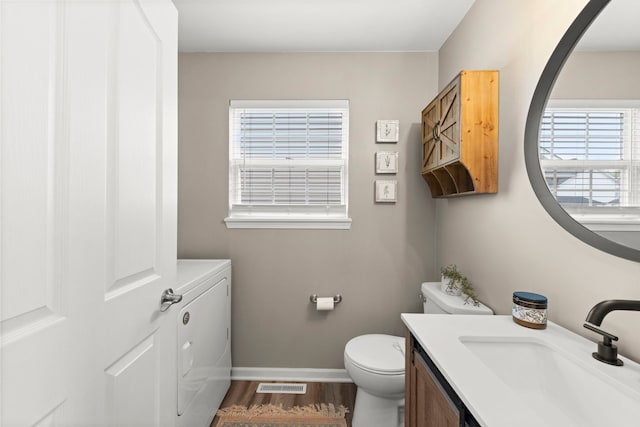 711 W Benham St, Kirkland, IL 60146 - bathroom with vanity and wood finished floors