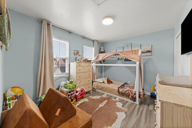 711 W Benham St, Kirkland, IL 60146 - bedroom with wood finished floors