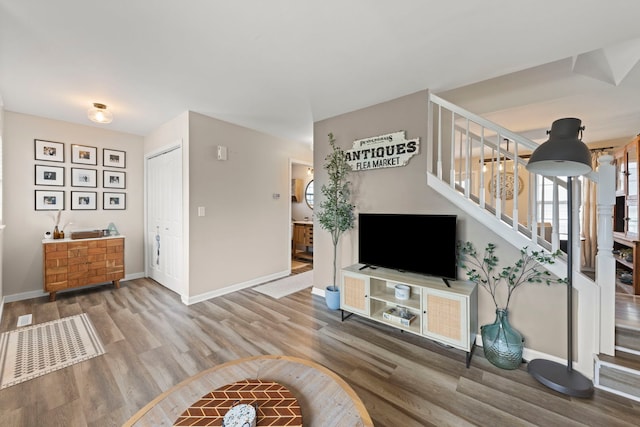 711 W Benham St, Kirkland, IL 60146 - living room with wood finished floors and stairs
