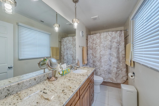 1716 N Beech Rd, Mount Prospect, IL 60056 - bathroom with visible vents, tile patterned floors, toilet, and vanity