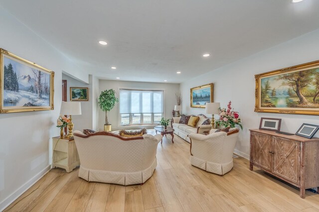 1716 N Beech Rd, Mount Prospect, IL 60056 - living room with baseboards, recessed lighting, and light wood-style flooring