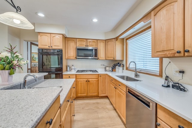 1716 N Beech Rd, Mount Prospect, IL 60056 - kitchen with a sink, appliances with stainless steel finishes, light brown cabinets, and hanging light fixtures