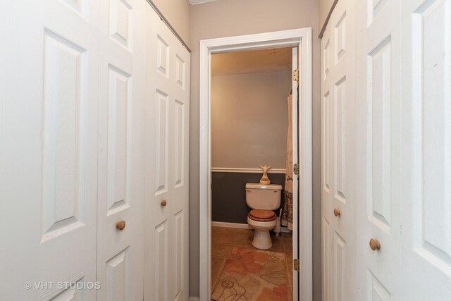 3026 Roberts Dr Unit 4, Woodridge, IL 60517 - bathroom featuring tile patterned floors, toilet, shower / bath combo, and vanity